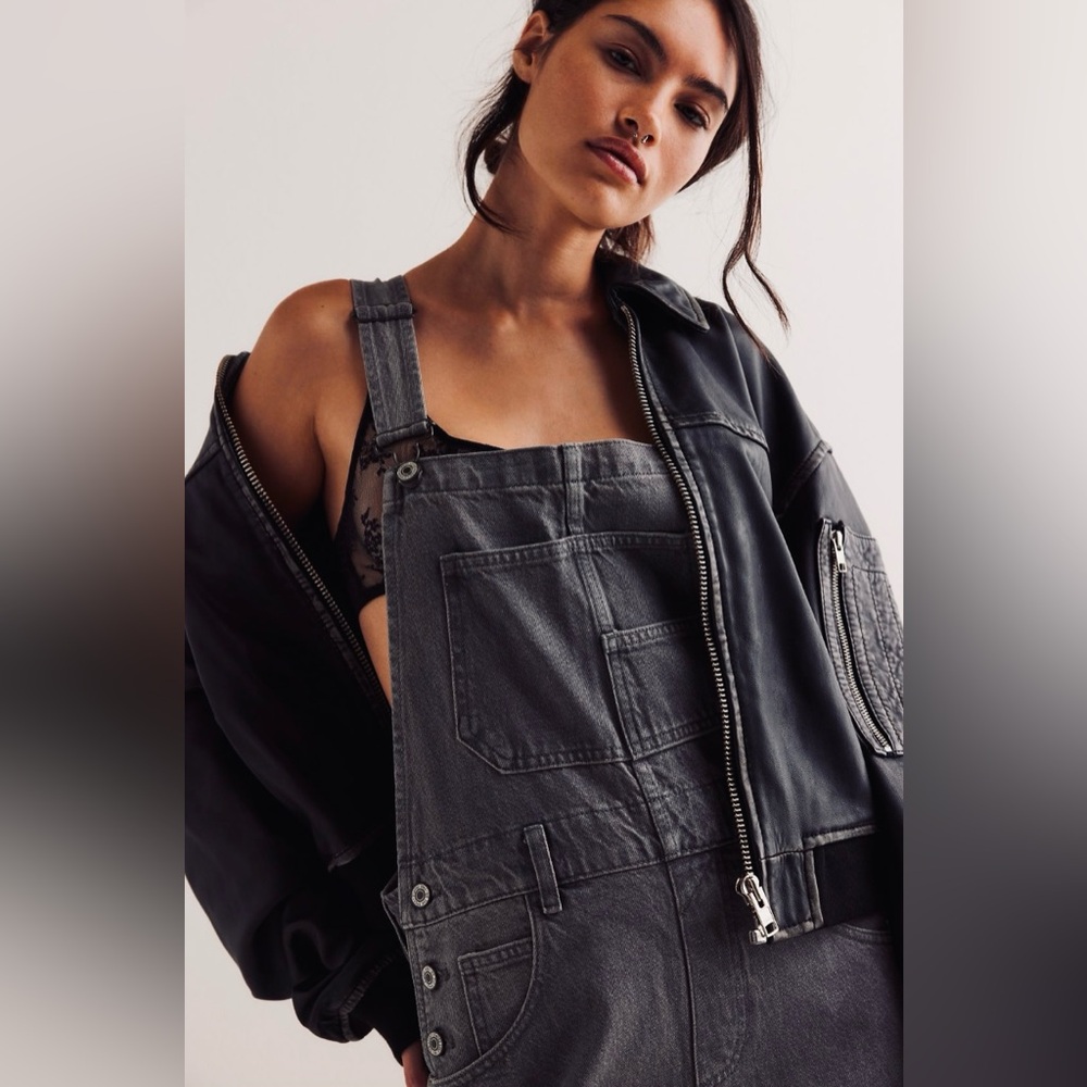 free people washed black classic denim overalls with a relaxed fit | size 27